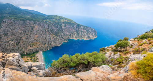Fototapeta Naklejka Na Ścianę i Meble -  Aerial view of butterfly canyon with beautiful beach near Oludeniz, Fethiye, Turkey