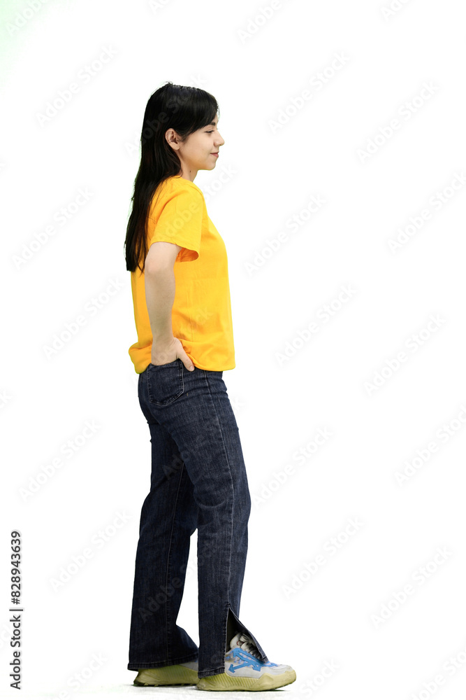 Fototapeta premium Woman, full-length, on a white background, hands on hips
