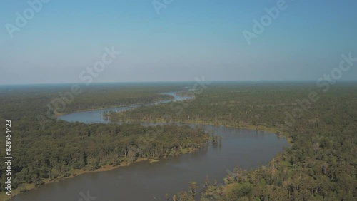 Wallpaper Mural Aerial Shot Of Tranquil Bayou Amidst Green Trees In Jungle Against Clear Sky, Drone Flying Forward On Sunny Day - Bayou Vista, Texas Torontodigital.ca