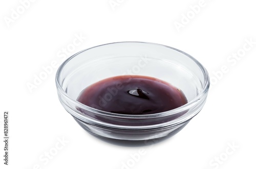 Teriyaki sauce in a bowl on a white isolated background