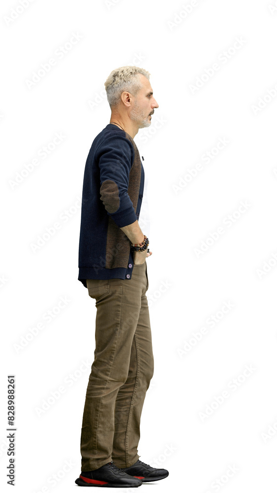 Fototapeta premium A man, full-length, on a white background, hands on hips