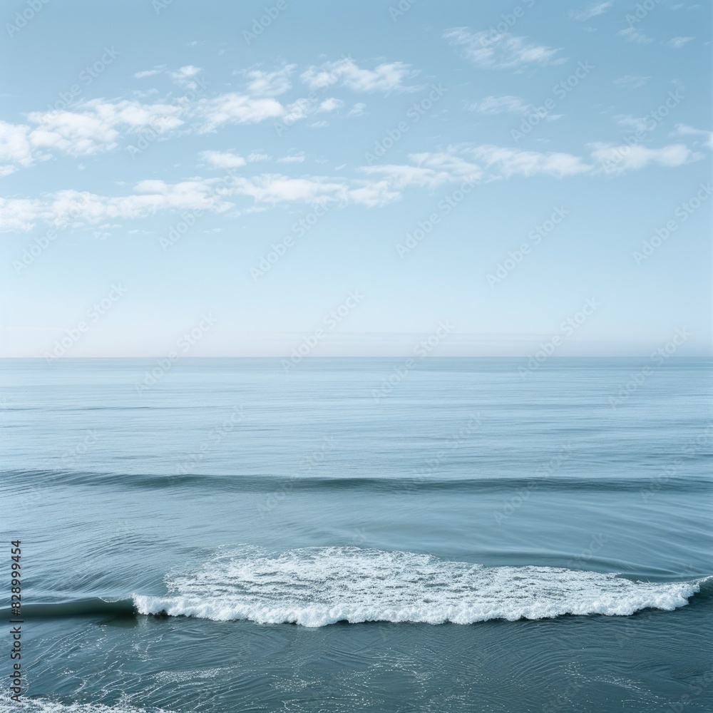 Simple Line Wave. Serene Pacific Ocean Coastline with Clear Blue Skies Simple Line Wave. Serene Pacific Ocean Coastline with Clear Blue Skies