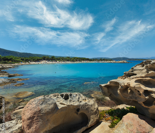 Aegean sea coast landscape, view near Karidi beach (Chalkidiki, Greece). People are unrecognizable.