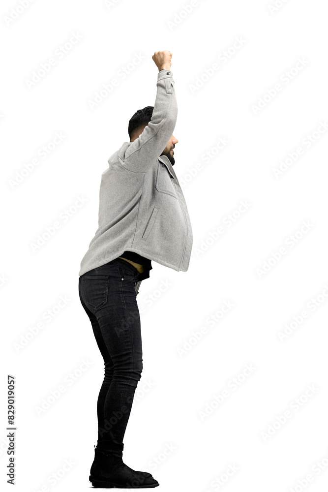 A man, full-length, on a white background, raised his hand up A man, full-length, on a white background, raised his hand up