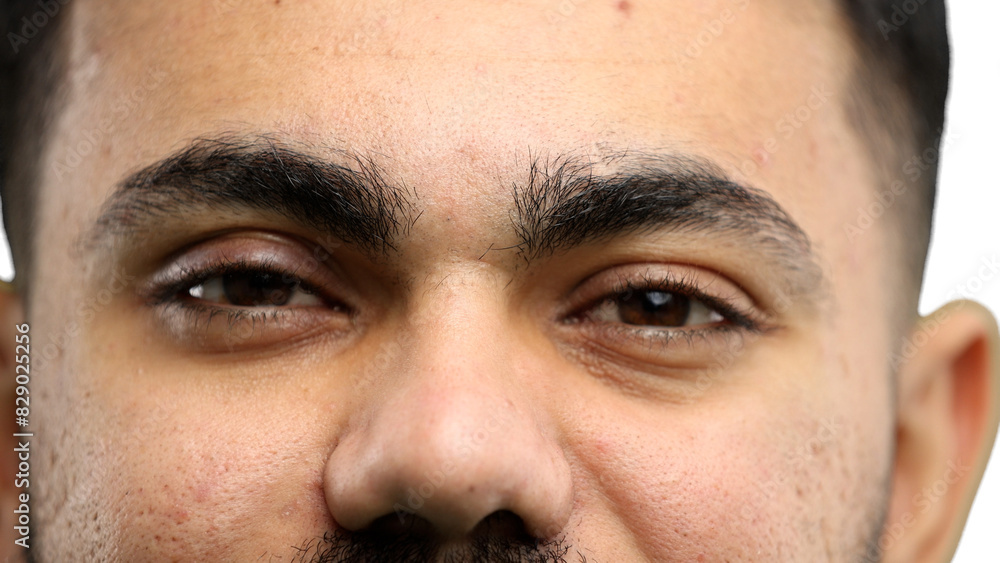 Fototapeta premium Man's eyes, close-up, on a white background