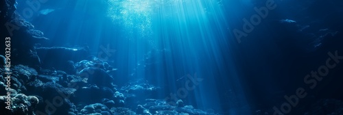 Underwater landscape with penetrating sunbeams creating a magical and enchanting marine environment