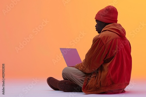 Young professional working remotely on a laptop in a serene outdoor setting, connected to Wi Fi, blending work and leisure