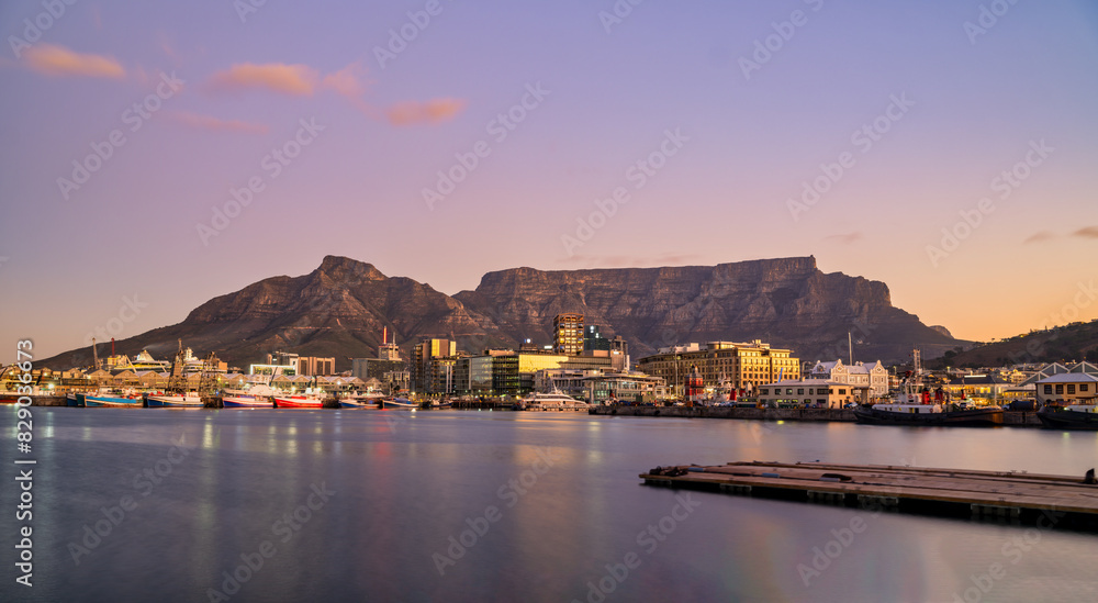 victoria & alfred v&a waterfront and table mountain in the background during sunset, Cape Town, South Africa