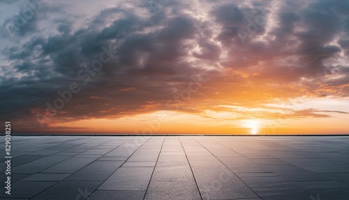 dark dramatic sky horizon epic sunset clouds landscape with black concrete floor