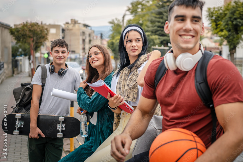 Obraz premium group of teenage students gen z sit in front of school university