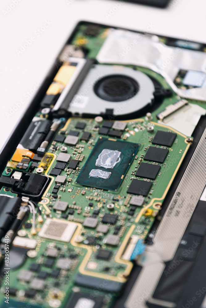 Motherboard inside a laptop, showing various components and connectors