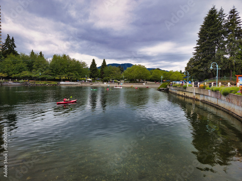 Water activity - Men in kayak - maffeo sutton park, nanaimo, vancouver island, british columbia, canada photo