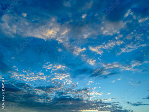 Blue sunrise sky with clouds
