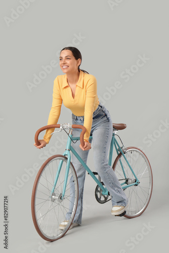 Beautiful young woman ridin...