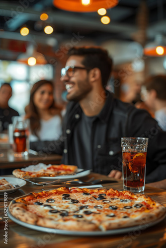Wallpaper Mural Selective focus of Caucasian businessman eating pizza together in restaurant. Torontodigital.ca