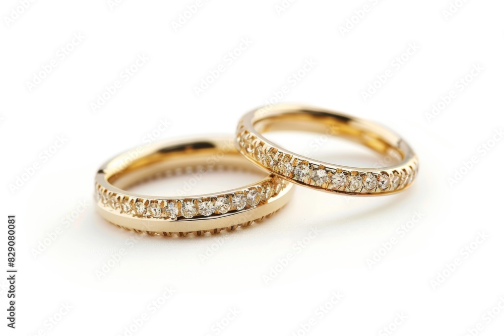 Golden wedding rings on a white background. Bride and Groom Rings Golden wedding rings on a white background. Bride and Groom Rings