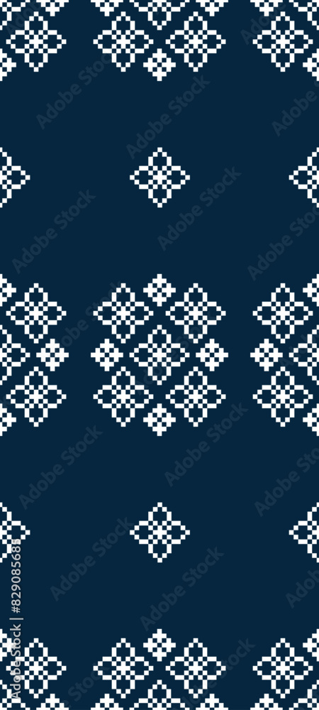 Fototapeta premium Traditional ethnic motifs ikat geometric fabric pattern cross stitch.Ikat embroidery Ethnic oriental Pixel navy blue background. Abstract,vector,illustration. Texture,decoration,wallpaper.