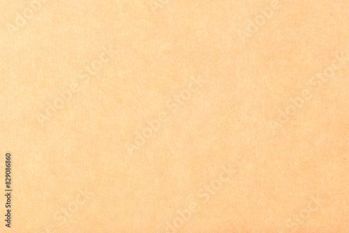 A tan background with no visible objects, texture background of retro vintage yellowed paper