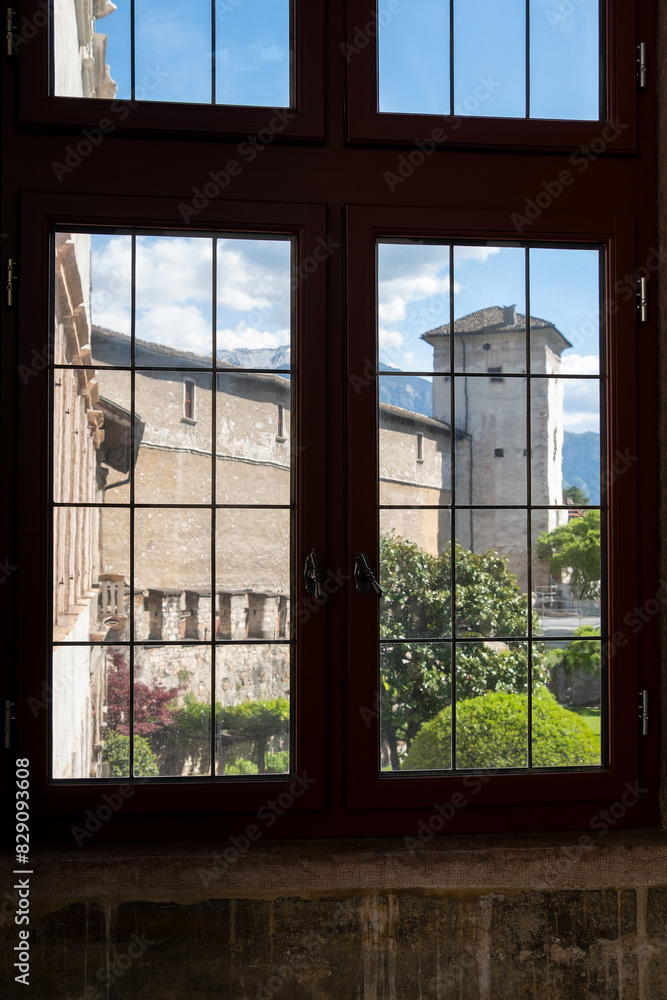 View of palace through a window, Buonconsiglio Castle Museum, Trentino-Alto Adige, South Tyrol, Italy View of palace through a window, Buonconsiglio Castle Museum, Trentino-Alto Adige, South Tyrol, Italy