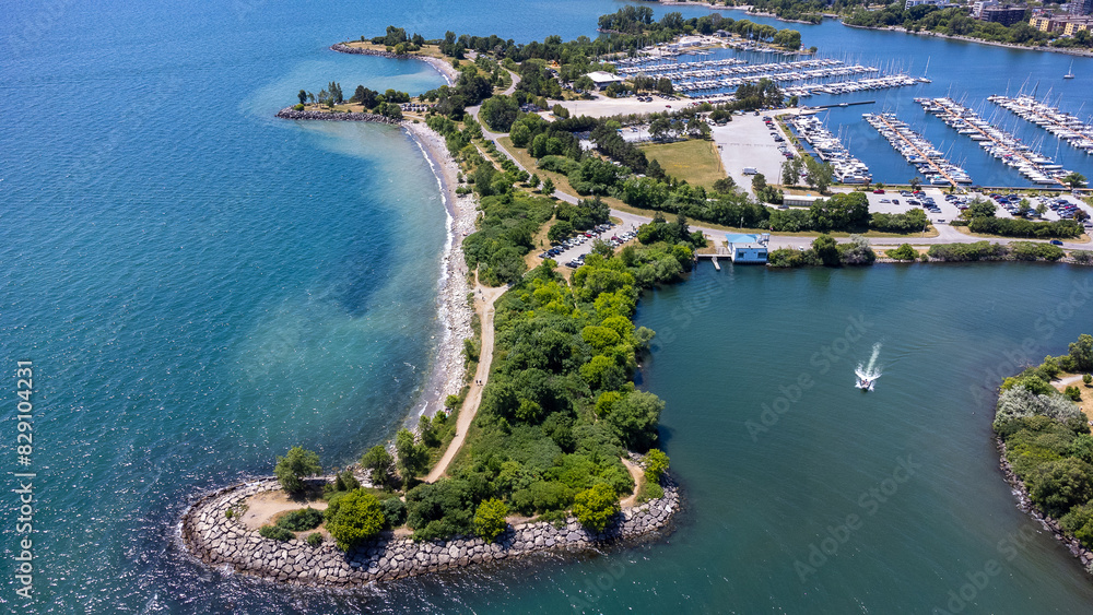 Naklejka premium Drone of Humber Bay Park with Marina - Toronto Spring Summer Season - Mimico, Etobicoke, Ontario, Canada.
