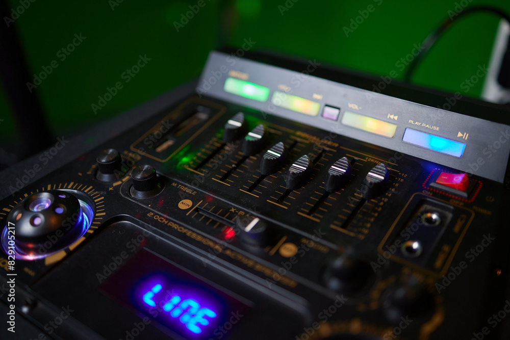 Hands playing buttons on an electronic keyboard mixer Hands playing buttons on an electronic keyboard mixer