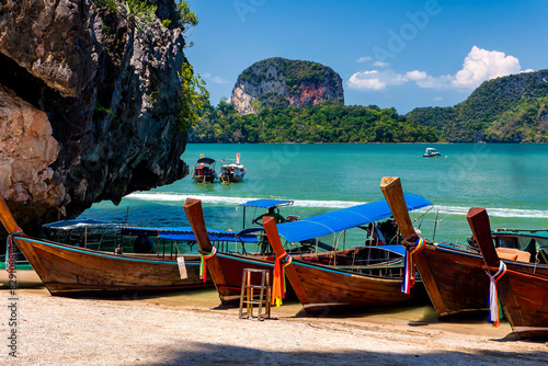 Traditional Thai Longtail boats on a sandy, tropical beach © whitcomberd