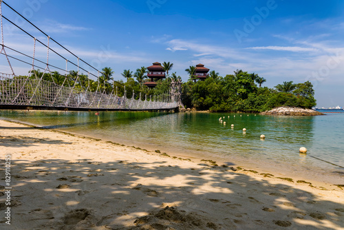 Photography Rope suspension bridge and lush vegetation at Palawan Beach, Singapore