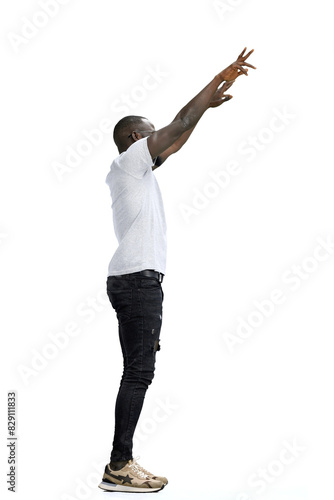 A man, full-length, on a white background, waving his arms