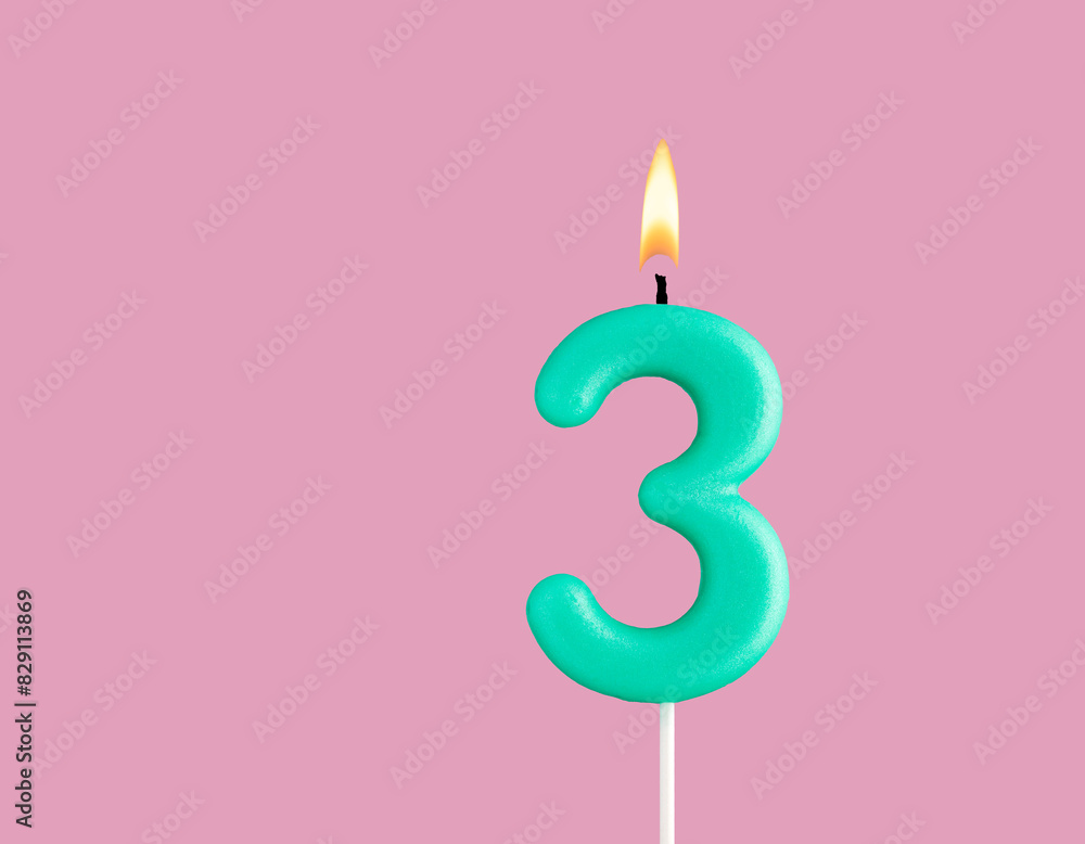 Green candle number 3 - Birthday card on pastel pink background Green candle number 3 - Birthday card on pastel pink background