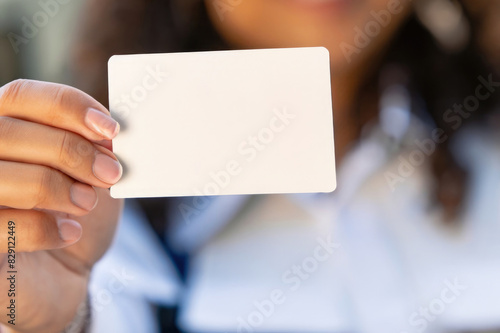 woman holding blank card