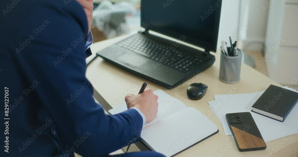 Businessman Writes Financial Report Businessman Writes Financial Report
