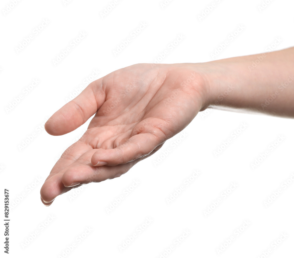 Woman holding something in hand on white background, closeup Woman holding something in hand on white background, closeup