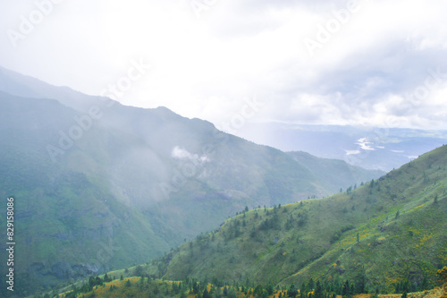 View from Baker's Bend: Clouds Touching Mountain Top, Autumn Vibes, Nonpareil Mountain, Belihuloya, Sri Lanka photo