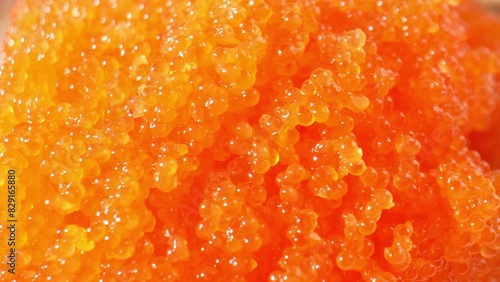 Tobiko  like other fish roe  rich in protein  omega-3s  and vitamin B12. Nutritious addition to meals  offering health benefits alongside delicious taste. Seafood concept. Food background.  