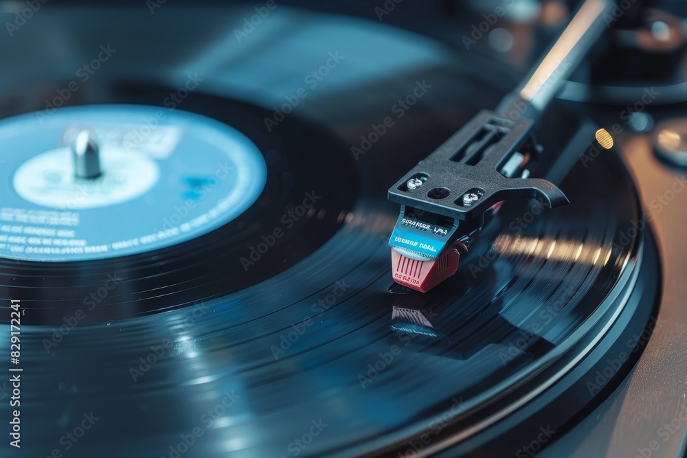A black vinyl record rests on a turntable close up A black vinyl record rests on a turntable close up