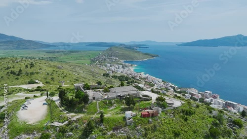 Lekursi Castle on Lekursi Hill over Saranada from a drone, Albanian Riviera, Albania, Europe photo
