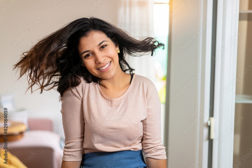 Naklejka premium portrait of a woman, black person, afro american girl, curly hair, young woman in a house, happy housewife