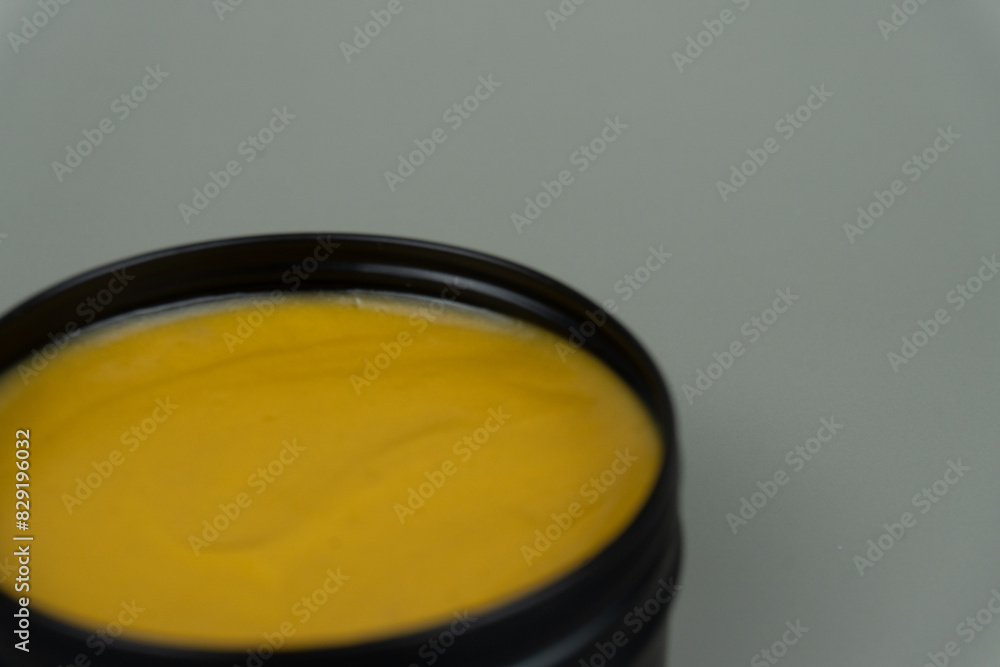 Yellow Clay Pomade Container Mock-up with Gray Background Yellow Clay Pomade Container Mock-up with Gray Background
