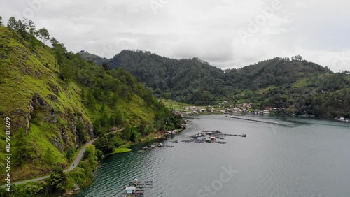 Aerial video view of the road at the foot of the hill on the edge of Takengon city, Aceh photo