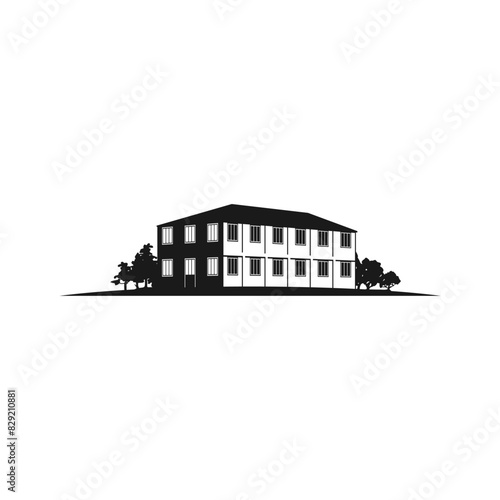 old building logo with yard and trees