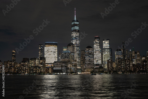 Night in The NYC city, USA, United States. Night day with iconic buildings. New York City NYC Manhattan Downtown Skyline, viewed from Jersey City, USA. photo