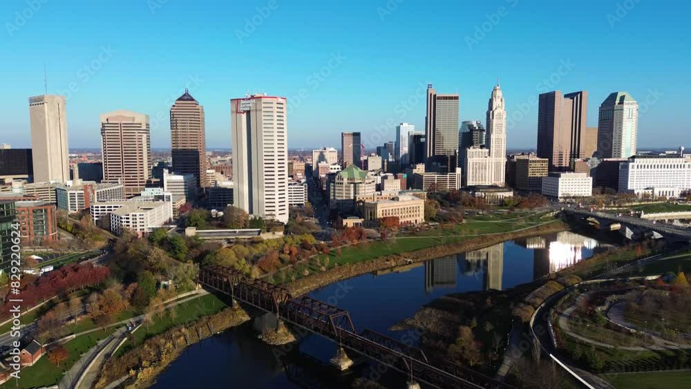 Columbus, Ohio skyline with Scioto River. Aerial drone. Autumn with reflections of the downtown skyline in the Scioto River Columbus, Ohio skyline with Scioto River. Aerial drone. Autumn with reflections of the downtown skyline in the Scioto River