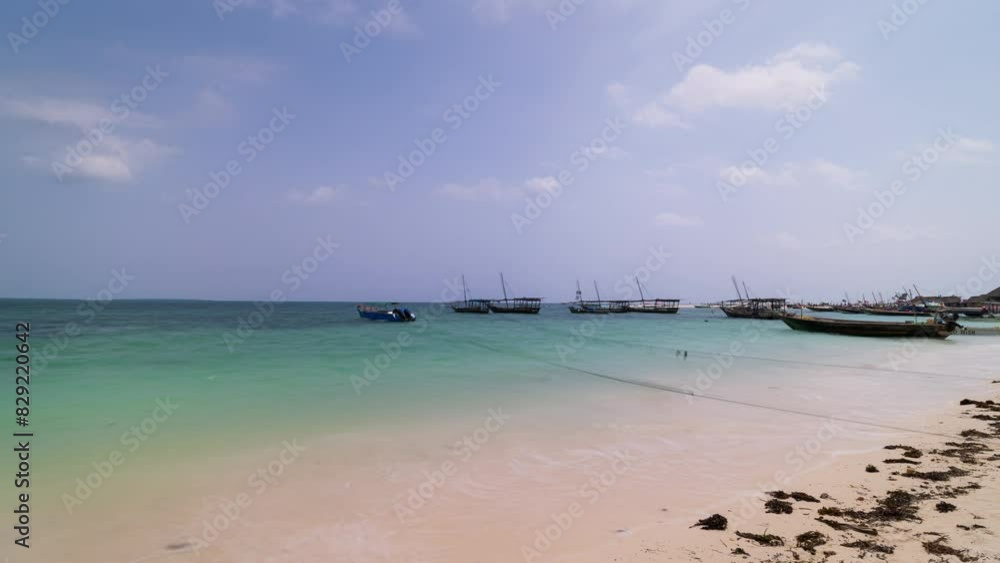 Fishing wooden boats moored near the beach, Zanzibar,Tanzania Africa Fishing wooden boats moored near the beach, Zanzibar,Tanzania Africa