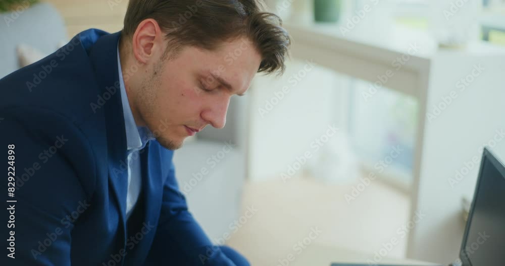 Businessman Analyzes Financial Losses Businessman Analyzes Financial Losses