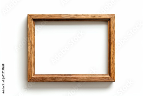 Elegant wooden picture frame on white background