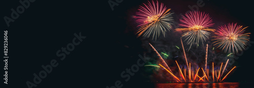 Banner Colorful vibrant Firework celebrate anniversary happy new year 2024  4th of july holiday festival. Banner firework night celebrate national holiday. countdown new year 2025 with copy space
