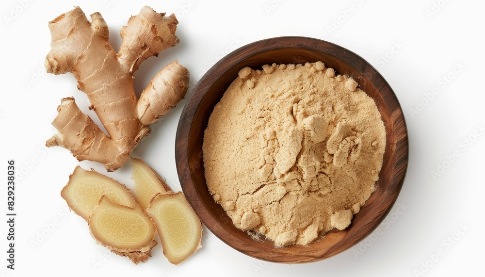 Fototapeta premium Ginger powder isolated on white in wooden bowl