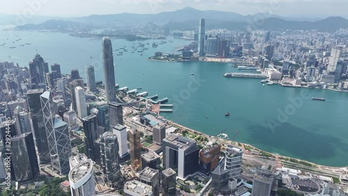 Aerial drone skyview of Hong Kong West Kowloon Victoria Harbour Financial Tsim Sha Tsui Hung Hom Central Admiralty Wan Chai Happy Valley Wong Nai Chung Stadium Tai Hang Causeway Bay Tai Hang photo
