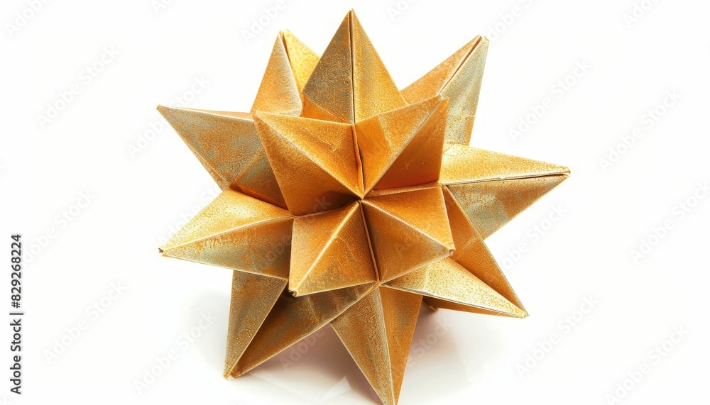 Origami s golden star on white backdrop