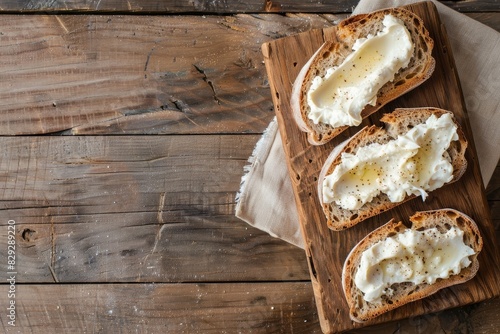 Top view of cream cheese on rye toast photo